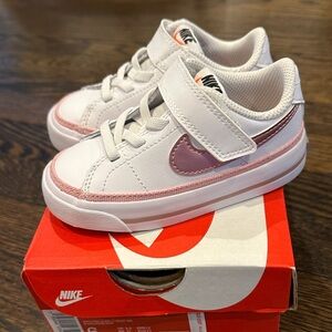 Pink/white Nike sneakers